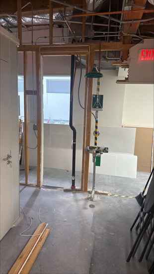 Emergency safety shower and eyewash station installed during an interior renovation